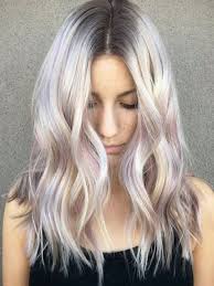 This dusty blonde dye job with lavender hints is a subtle take on the trend. Dusty Rosy Platinum Blonde Hair Elevate Salon Institute Chubbuck