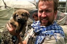 The Taliban are next door but I won't abandon my animal shelter's staff –  or my dogs, says ex-Marine in Kabul