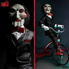 saw billy the puppet with tricycle 12