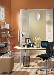Brown is a color that won't be distracting but will still feel warm. Warm Workable Home Office Home Office Colors Yellow Home Offices Office Paint Colors