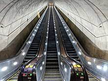 Escalators and moving walks still play a key role in transporting large numbers of people. Escalator Wikipedia