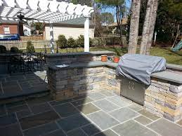 Outdoor Kitchen And Pergola With A