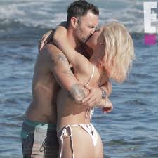 She is dating a boyfriend secretly. See Every Pic From Brian Austin Green And Sharna Burgess Steamy Trip E Online Ca