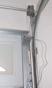 Before attempting to remove the broken cable, it is essential to release the tension in the garage door torsion springs. Broken Garage Door Cable Discount Garage Door