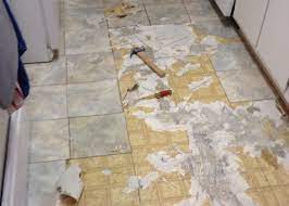 tearing out old kitchen flooring