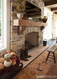A Stone Fireplace And Wood Mantle Add A