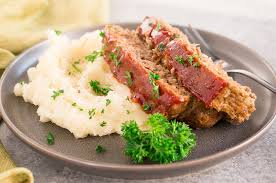 2 lb meatloaf mix (beef, pork, and veal), 1 cup cooked oatmeal, 1 cup finely chopped onion, 1/3 cup finely chopped fresh parsley, 1/4 cup soy sauce, 2 large eggs, 2 teaspoons finely chopped garlic, 1/2 teaspoon dried thyme, 1/2 teaspoon black pepper, 1/2 cup chili sauce. Meatloaf Recipe How To Make Meatloaf Delicious Meets Healthy