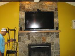 decosee tv above fireplace