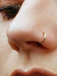 Your nose piercing should run you between $25 and $30 per piercing, though the jewelry is a separate cost. Amazon Com 14k Gold Filled Faux Clip On Nose Ring 20g No Piercing Needed Handmade