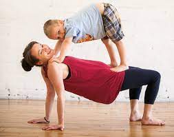teaching group or partner yoga for kids