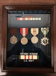 Military shadow boxes are a beautiful way to commemorate the sacrifices and honor of serving in the armed forces. 8 X 10 Cherry Military Shadowbox Medal Display Frame
