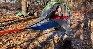 Not quite a hammock, not quite a tent, the tentsile encases you (and a companion) in a suspended pod with the floor space and support of a tent bottom. Tentsile Una Tree Tent Review 50 Campfires