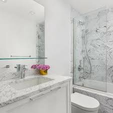 floating glass shelf over bath vanity
