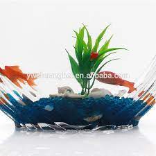 These heart shaped acrylic fish bowl comprise of products such as artificial plants, fishes, jellyfishes, stones, ferns, toy divers, and many more. Heart Shaped Transparent Cheap Fish Tank For Decoration China Yiwu Shuang Bei Glasswork