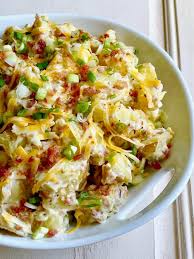 A tangy sour cream dressing turns a basic potato salad recipe into something special. Baked Potato Salad Loaded With Bacon Cheese And Sour Cream