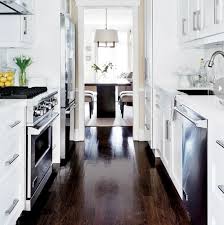 View of small galley kitchen design from the white hallway. 21 Best Small Galley Kitchen Ideas Galley Kitchen Design Kitchen Remodel Small Kitchen Design Small