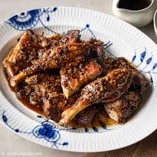 roasted duck legs with black pepper