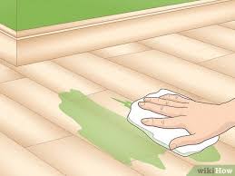remove paint on hardwood floors