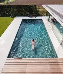Glass Pool House Has A Concrete Roof