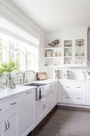 polished chrome handles with white cabinets