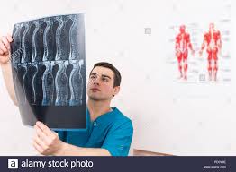 Physiotherapist Radiographer Or Doctor With An X Ray Of The