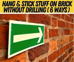 How To Hang Stick Stuff On Brick Wall