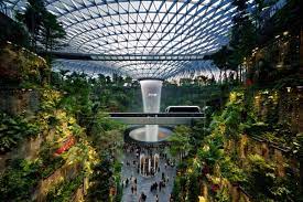 Changi airport terminals 1 and 2 feel like a 1970s hotel lobby with plush carpets and too much beige, but it is the most efficient 1970s hotel lobby in the world. Jewel Changi Airport Singapur 2019 Structurae