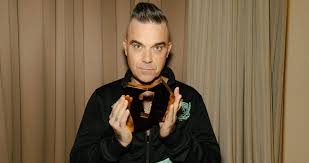 Robbie Williamss Christmas Album Hits Number 1 Matches