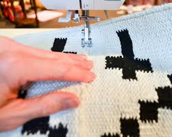 how to sew two small rugs together to
