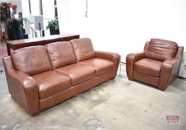 couch and club chair used brown leather