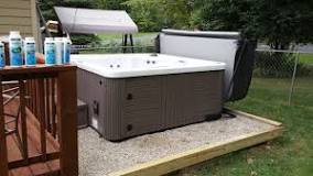What should I put down under my hot tub?
