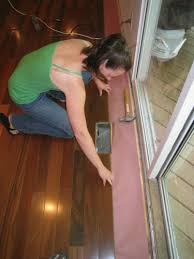 install hardwood floors around heating