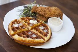 1/2 chix smothered with gravy & onions, 2 waffles, our own mix. La S Best Dishes Chicken Waffles Smackdown