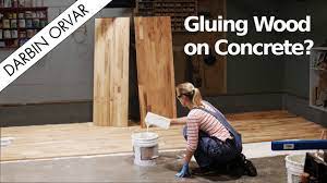 glue hardwood flooring to concrete