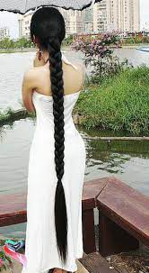 Beautiful bakview of long braid near a lake - [ChinaLongHair.com] | Long  indian hair, Long black hair, Long hair women