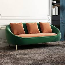 orange velvet upholstered oval sofa