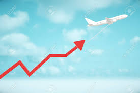 Airplane Dragging Red Chart Arrow On Sky Background