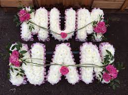 Warm regards and a big thank you from steve and robyn and the bradley family. Mum And Nan Tributes Edged With Pink Ribbon Based With White Chrysanthemums With Sprays Of Pink Aqua Roses Flower Crafts Funeral Flowers Funeral Floral
