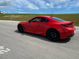 A low, wide fastback coupe that's sleek but not striking. First Ride 2022 Toyota 86 Redesign Rewards Drivers