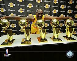 The current design, depicting a basketball over a hoop and basket, was first awarded in 1977 still under its original name, which was changed in honor of former nb. Amazon Com Kobe Bryant Los Angeles Lakers 5 Nba Championship Trophies Photo Size 8 X 10 Home Kitchen