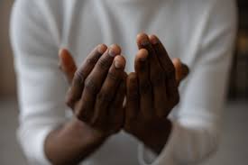 Crop black man praying at home · Free Stock Photo