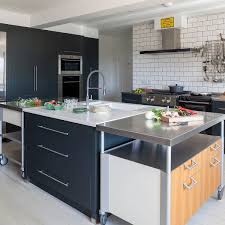 There is a very important advantage is the stainless steel kitchen cabinet is a green product. Black Kitchen Cabinets With Stainless Steel Countertop Backsplash Com