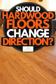 should hardwood floors change direction
