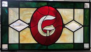 repairing a broken stained glass window