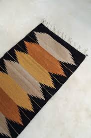 tierra mexican rug black base with