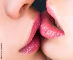 Kiss. Closeup lesbian mouths kissing. I Love You. Lesbian couple in love.  Intimate relationship and sexual relations. Stock Photo | Adobe Stock