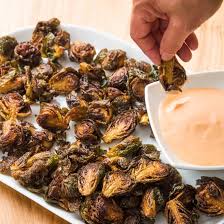 Toast some pine nuts, roughly chopped walnuts, or slivered almonds on the side and toss them with the roasted sprouts to serve. Fried Brussels Sprouts With Sriracha Dipping Sauce Cook S Country