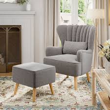 grey linen armchair with footstool and