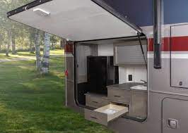10 amazing rvs with outdoor kitchens