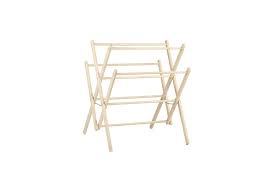 Accordion rack and 5 hooks, 1 kg respectively. 10 Easy Pieces Wooden Laundry Racks Remodelista